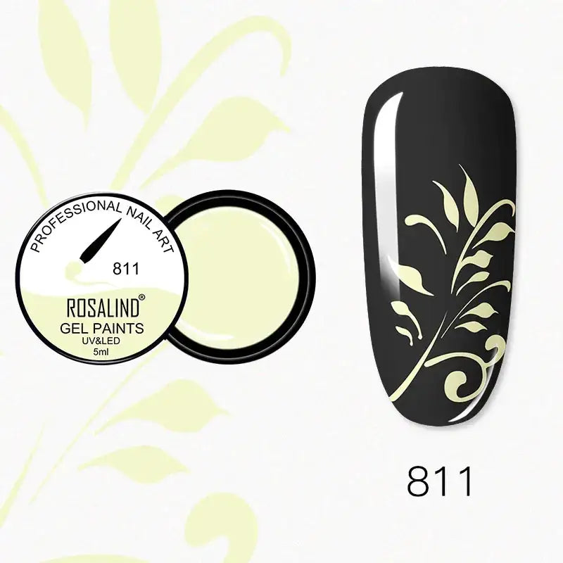 Black nail polish with a delicate, pale yellow leaf design applied to the tip.
