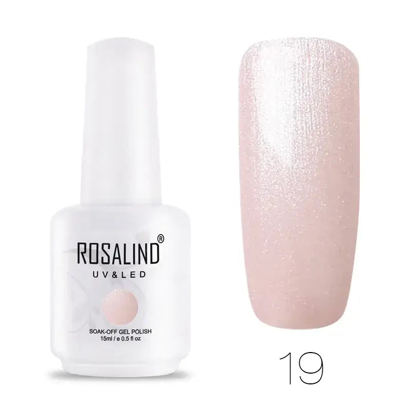 A sleek white bottle of rosalind uv&led soak-off gel polish, featuring a soft pink shimmer finish with fine glitter particles.