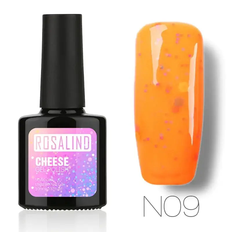 Rosalind cheese gel polish in a black bottle with a purple and pink glittery label, showcasing an orange nail polish with pink and yellow shimmer particles.
