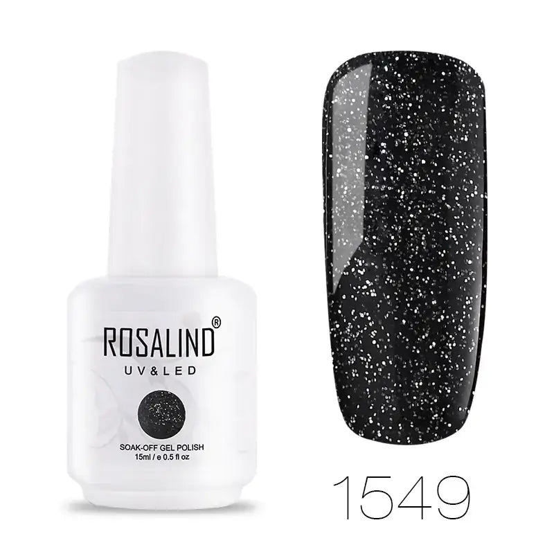 Black glittery nail polish in a white bottle labeled ’rosalind uv & led soak-off gel polish’ with product number 1549.