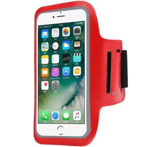 Red silicone armband with black elastic strap and side pocket, designed to securely hold a smartphone.