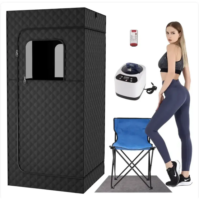 Black quilted fabric sauna tent with a rectangular window and zipper closure