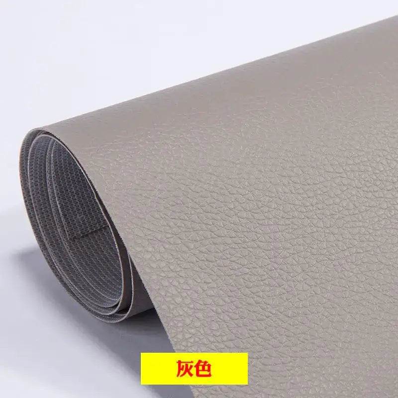 Gray faux leather roll with a textured, pebbled surface.