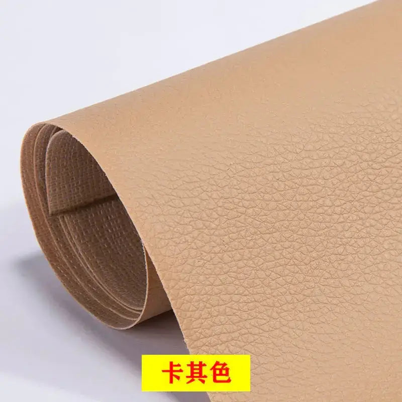 Tan faux leather sheet with a textured, pebbled surface.