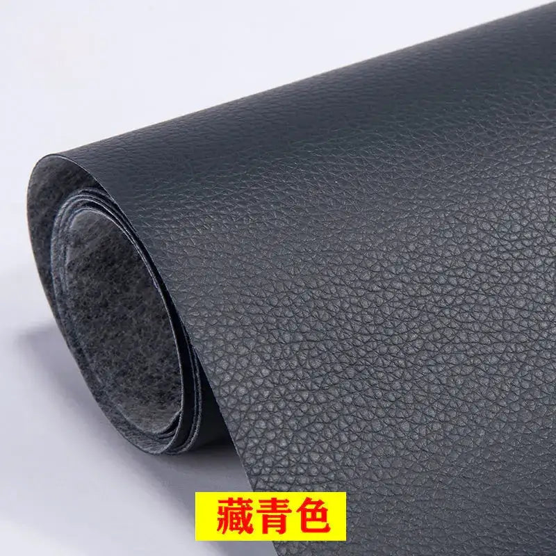 Black faux leather roll with a textured, pebbled surface and a matte finish.
