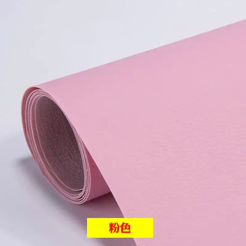 A soft pink, textured material rolled neatly for use as a decorative wall wrap.