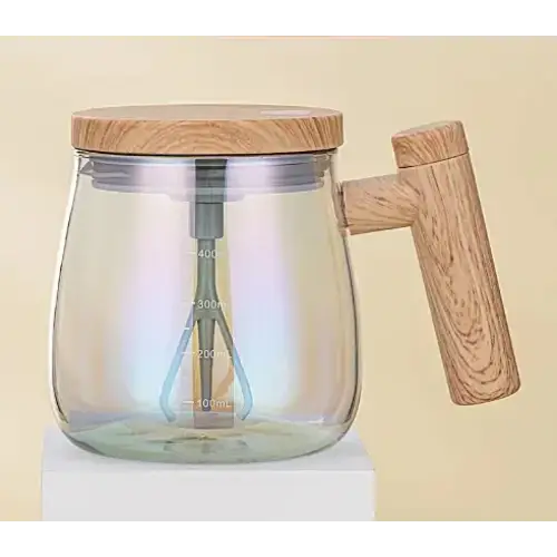 Clear glass mixing jar with a wooden lid and handle, featuring measurement markings in milliliters.