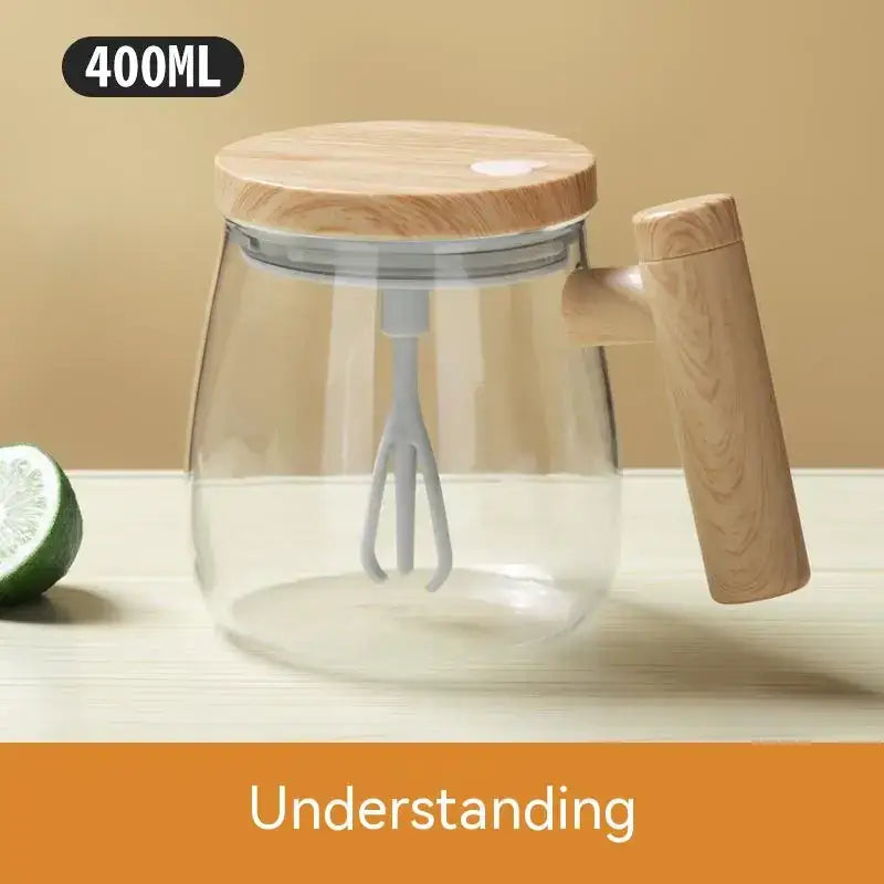 Clear glass pitcher with a wooden lid and handle, featuring an integrated white whisk inside.