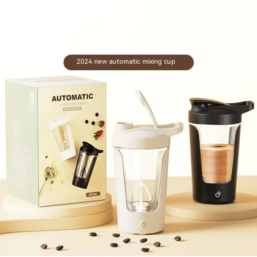 White and black automatic mixing cups with clear glass bodies, sleek plastic lids and bases, designed for blending drinks or shakes.