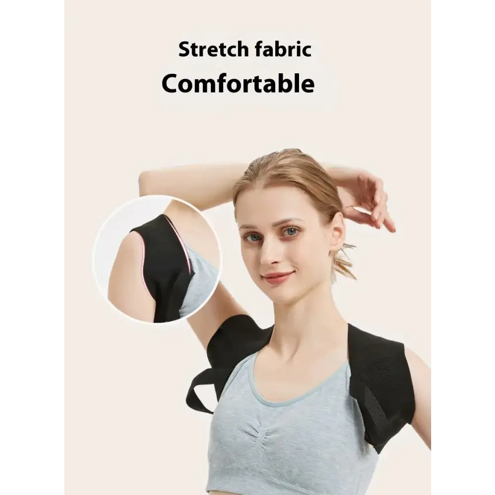 Black stretch fabric shoulder support with mesh panels and adjustable straps.