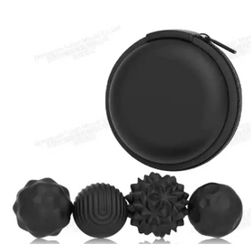 Black silicone massage balls in a matching black zippered case
