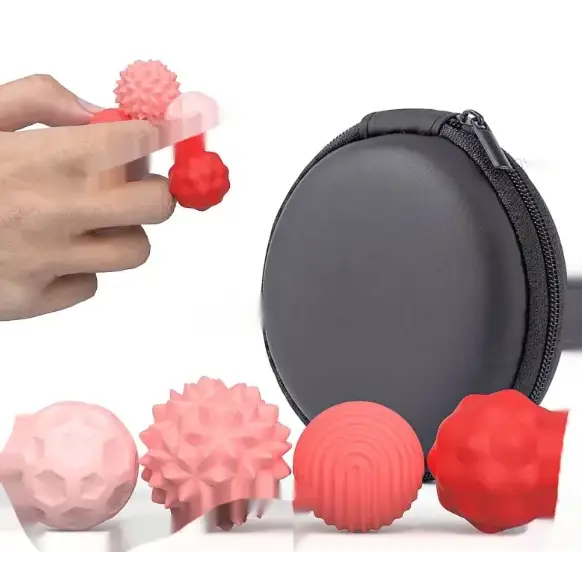 Red and pink silicone massage balls in various textured designs.