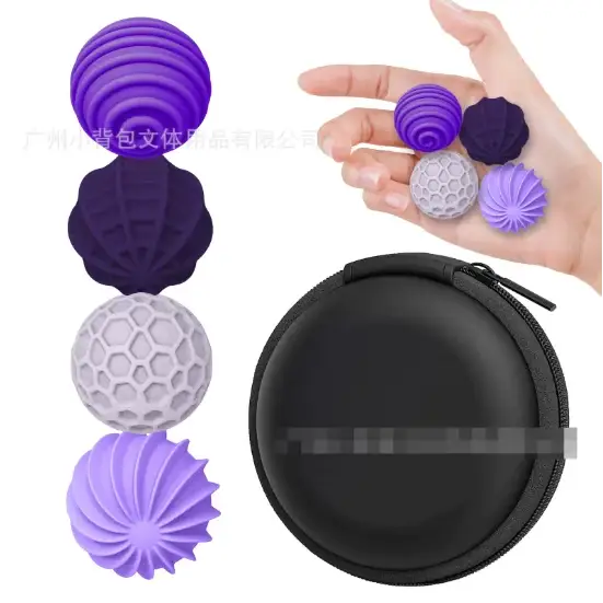 Set of five silicone massage balls in purple, lavender, and gray with textured patterns.