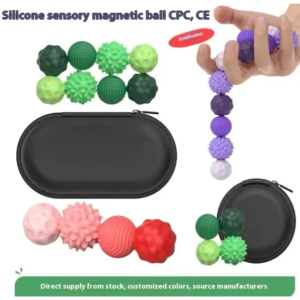 Set of colorful silicone sensory magnetic balls in various textures and patterns, displayed with black carrying cases.