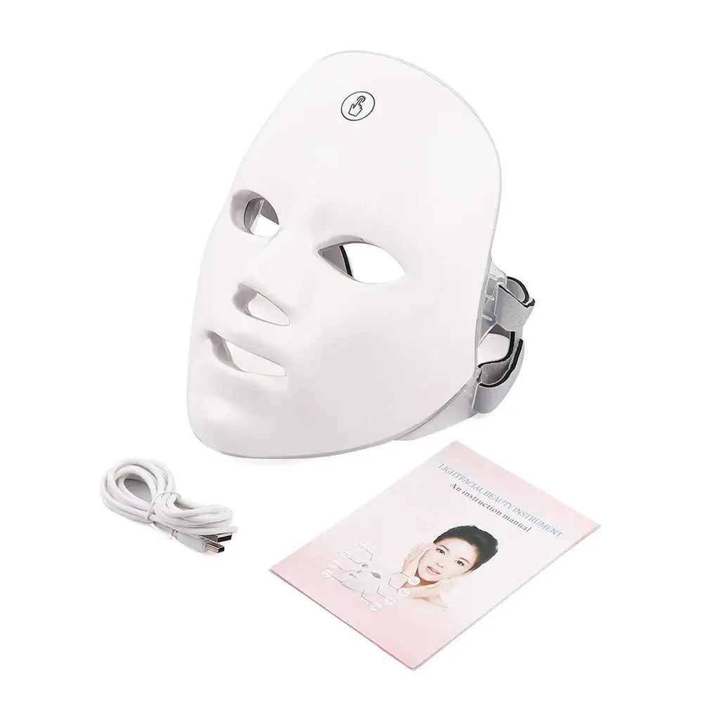 White led facial mask with adjustable gray headband and a touch-sensitive control button on the forehead.