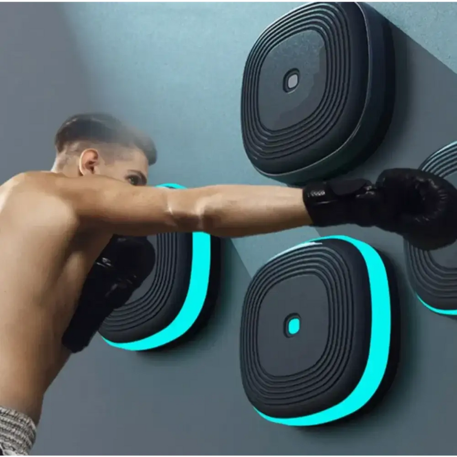 Black wall-mounted boxing pads with glowing teal led accents and concentric circular grooves.
