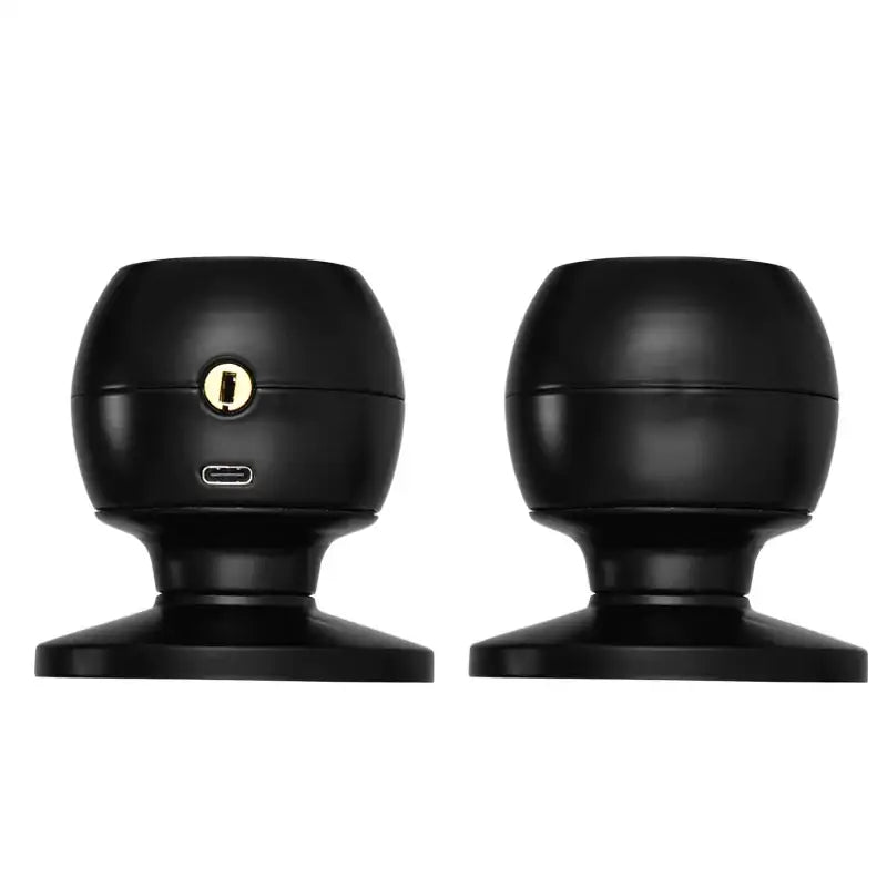 Black spherical smart door locks with a gold-colored keyhole and usb-c port.