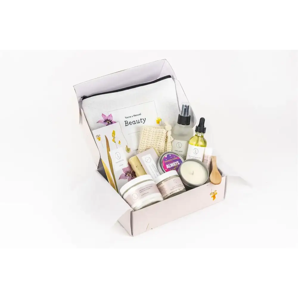A lavender and white beauty gift set in a minimalist box with floral accents.