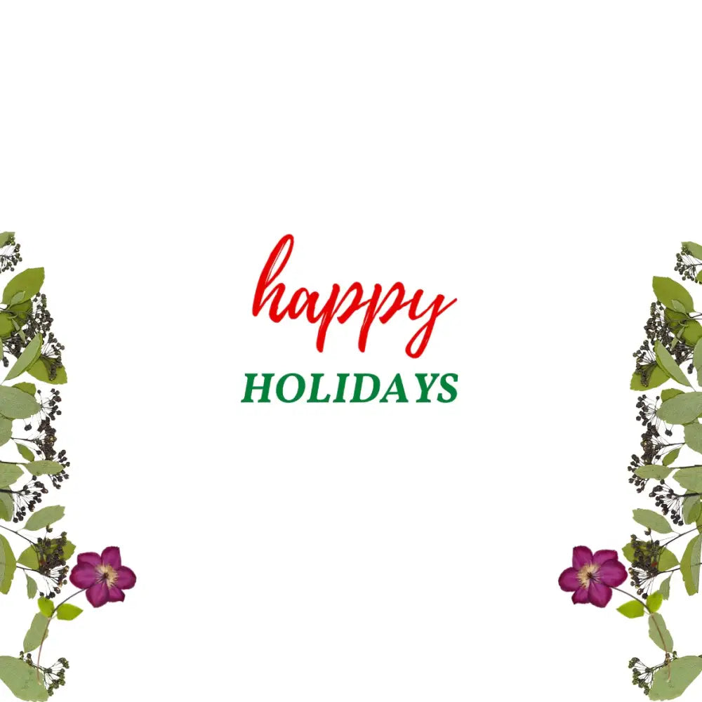 Red and green ’happy holidays’ text framed by purple flowers and greenery.