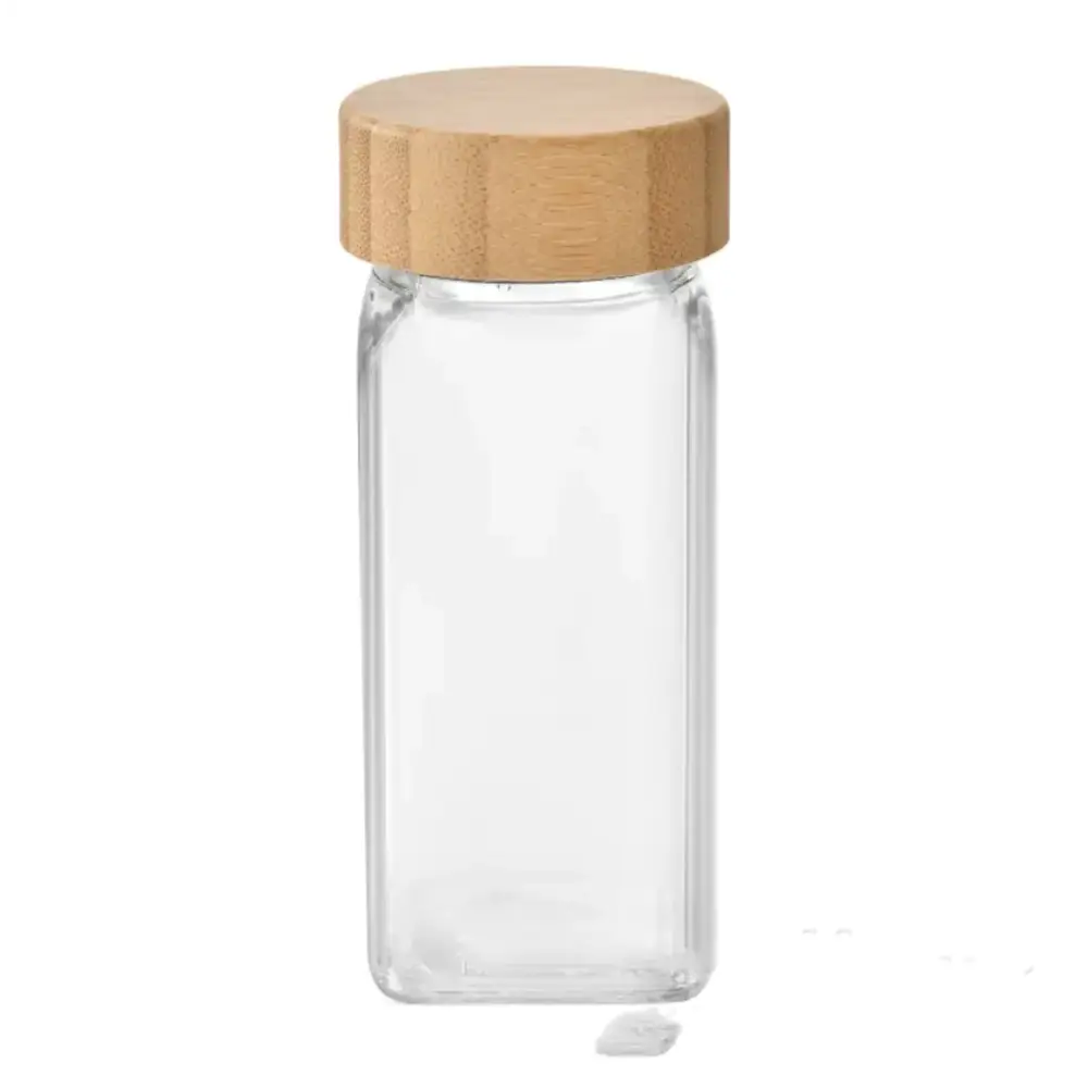 Clear glass rectangular spice jar with a light brown bamboo lid.