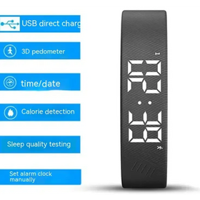 Black digital fitness tracker with a sleek, textured surface and white led display showing time.