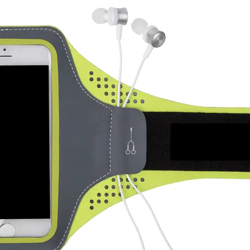 Lime green and gray athletic armband with perforated design holding a smartphone and white earbuds.