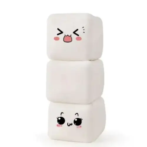 Stack of three white plush marshmallow-shaped stress relievers with cute cartoon faces.