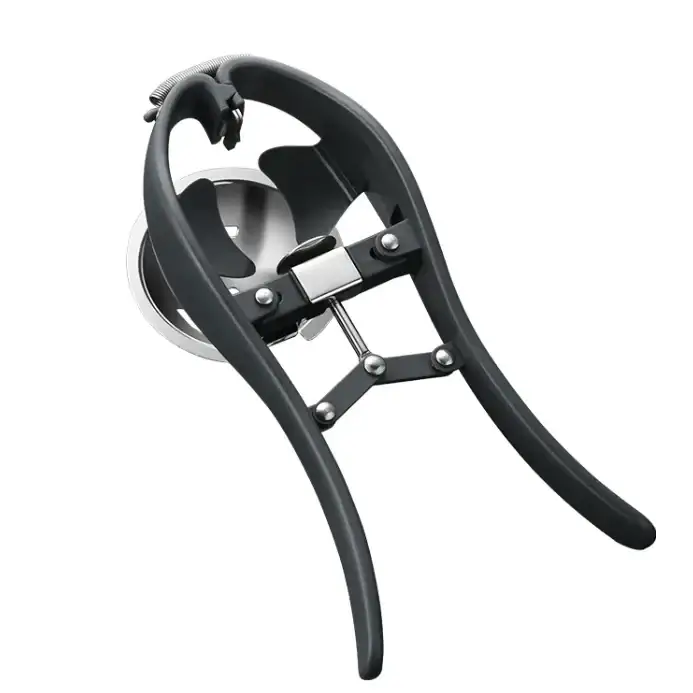 Black and silver egg cracker with ergonomic handles and a mechanical lever system.