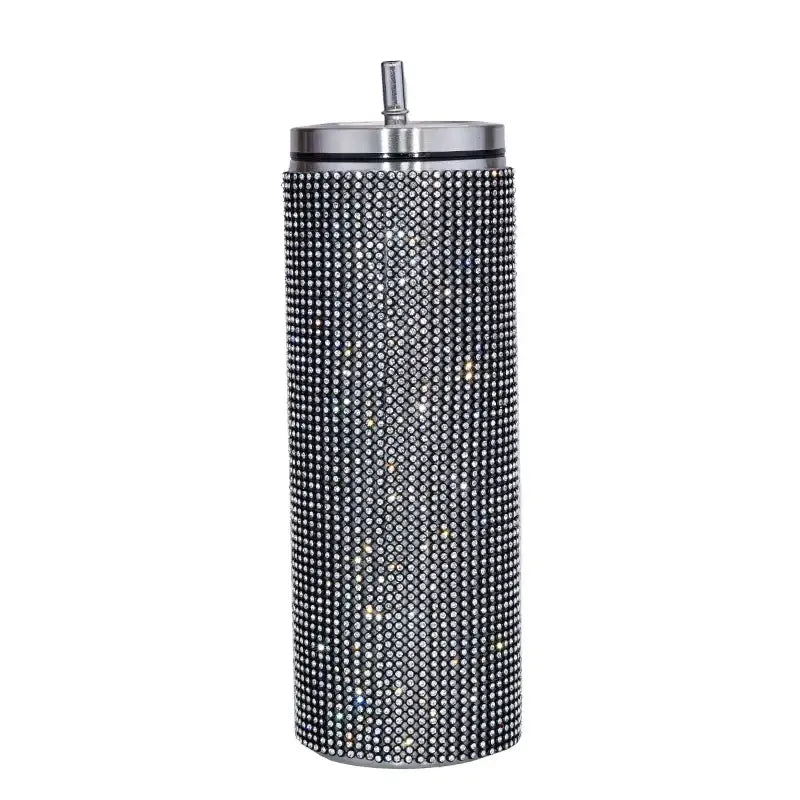 A sleek, tall black tumbler adorned with a dense pattern of sparkling silver rhinestones and featuring a metallic lid with an integrated straw.