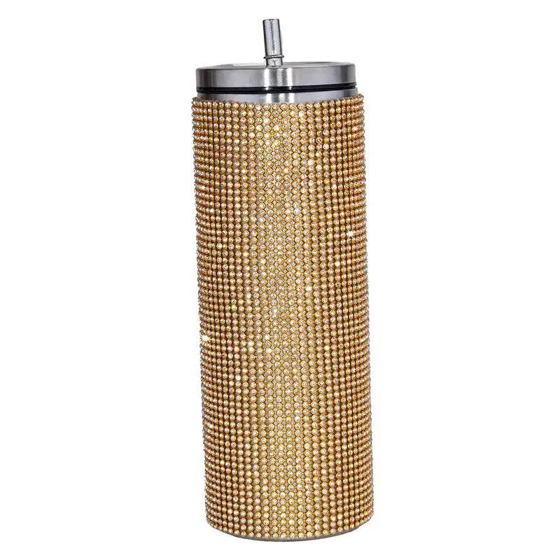 Gold rhinestone-encrusted stainless steel tumbler with a silver lid and straw.