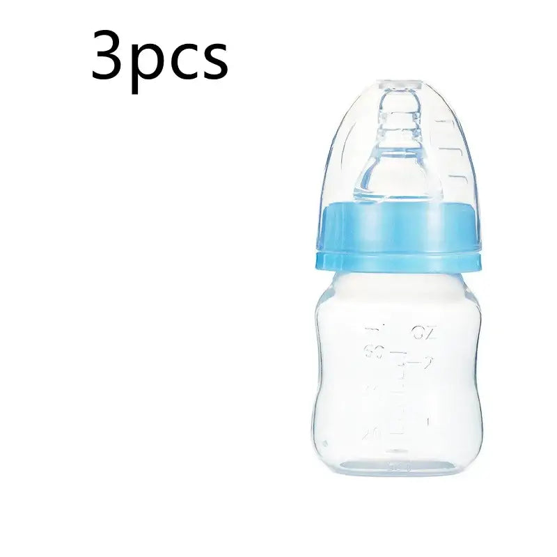 Clear plastic baby bottle with a light blue screw-on cap and nipple assembly.