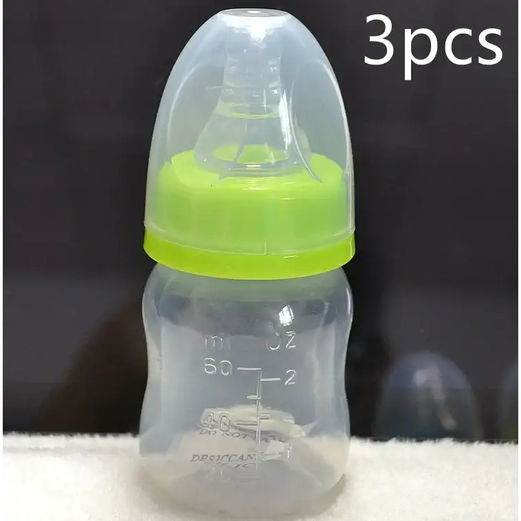 Clear plastic baby bottle with a bright lime green screw-on cap and transparent nipple cover, featuring measurement markings in milliliters and ounces.