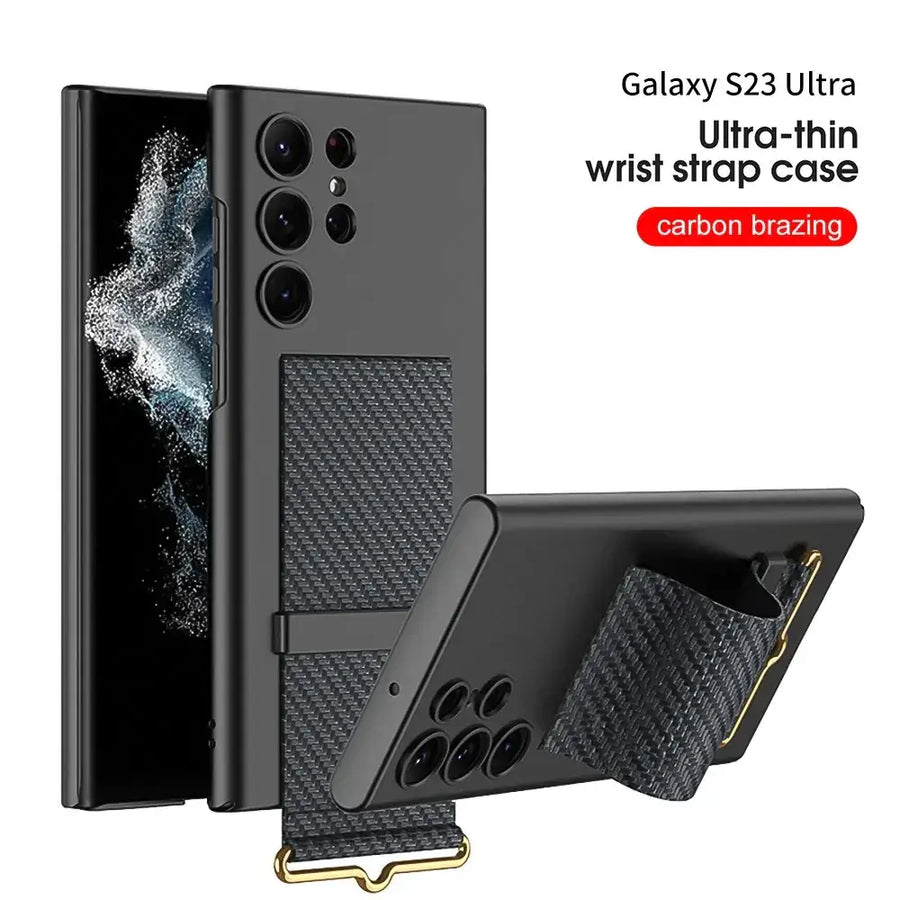 Black ultra-thin wrist strap case for galaxy s23 ultra with carbon braze texture and gold-tone hardware.