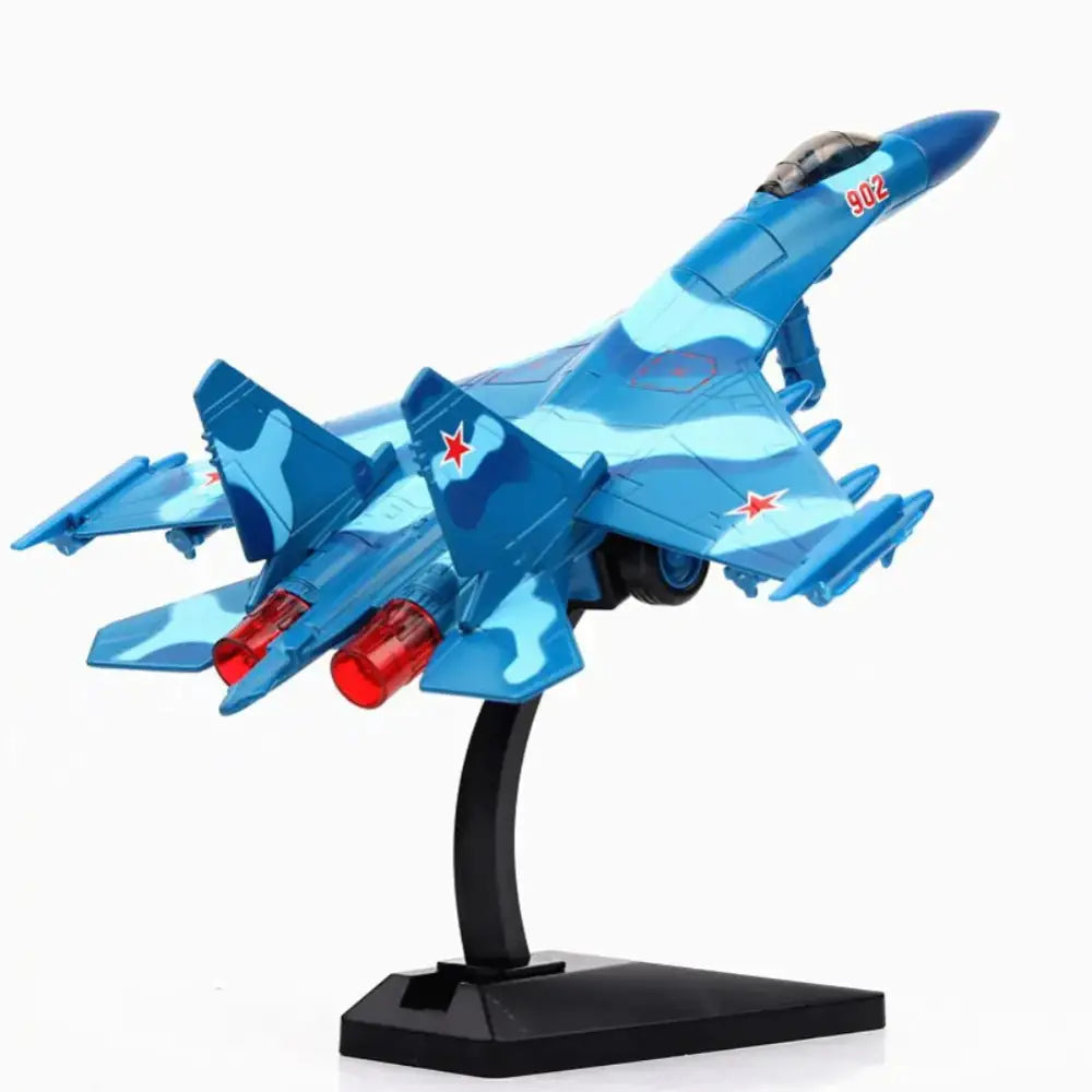 Blue camouflage-patterned metal model of a sukhoi su-35 fighter jet with red star insignia and numbered tail markings.