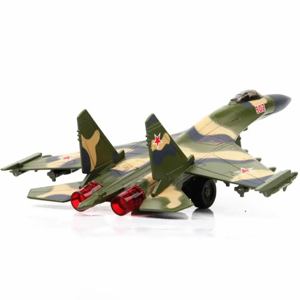 Green and beige camouflage-patterned metal model of a sukhoi su-35 fighter jet with red translucent engine nozzles.