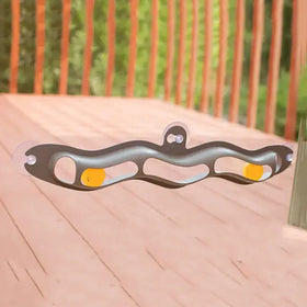 Silver metallic wind chime with a wavy, elongated design featuring three bright yellow circular accents and clear spherical beads at each end.