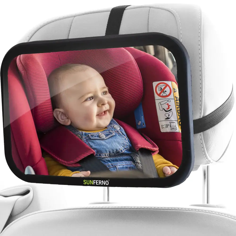 Black-framed sunferno rearview mirror designed for car seats, showing a smiling baby in a red safety seat.