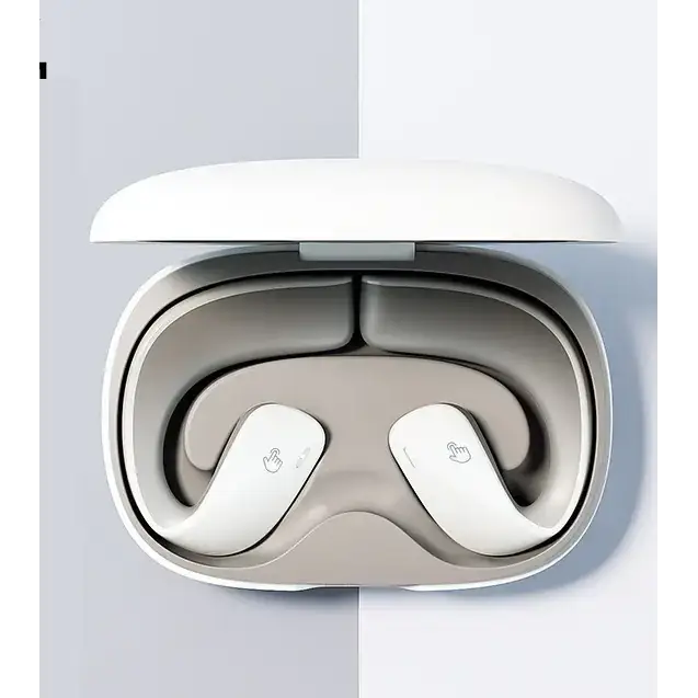 White wireless earbuds nestled in a sleek, minimalist charging case with soft-touch finish.