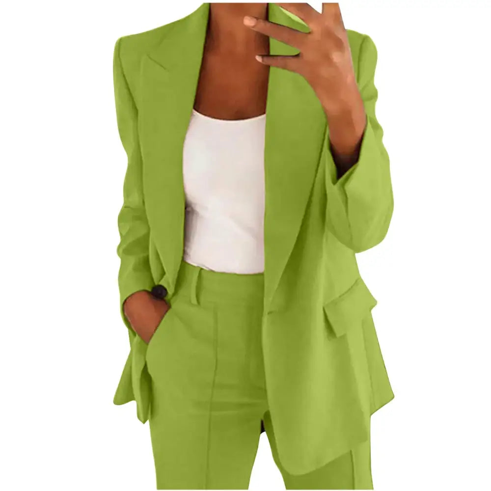 A vibrant lime green tailored blazer with a sleek, modern cut and matching pants.