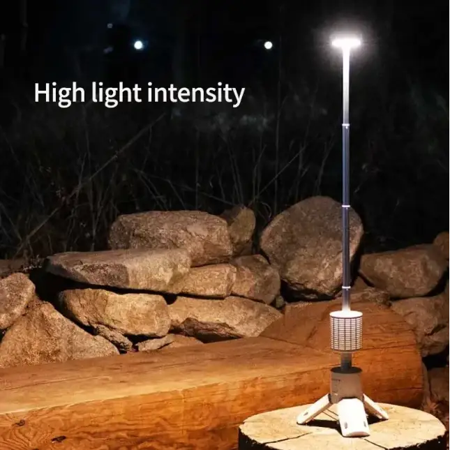 A sleek, silver-colored solar-powered led lamp with a tripod base and adjustable pole.
