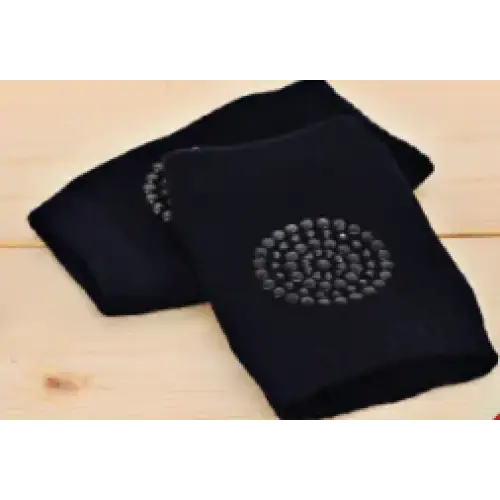 Black knee pads with a circular pattern of silver studs on the front.