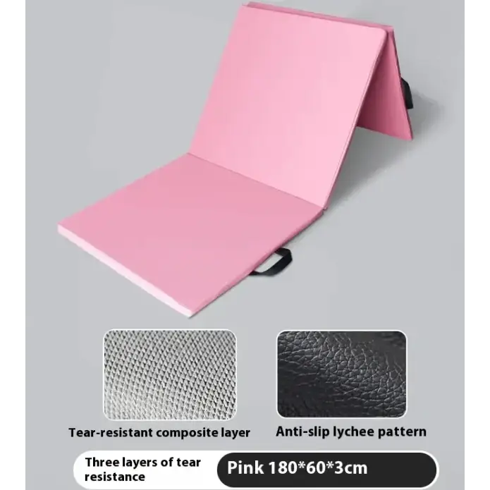 Pink foldable exercise mat with a tear-resistant composite layer and anti-slip lychee pattern surface.