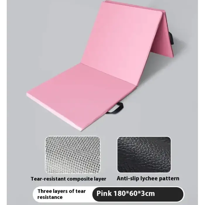 Pink foldable exercise mat with a tear-resistant composite layer and anti-slip lychee pattern surface.