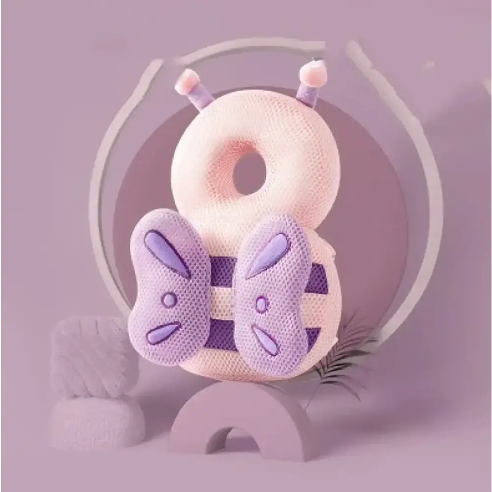 Pastel pink and lavender mesh donut-shaped plush toy with bunny ear accents.