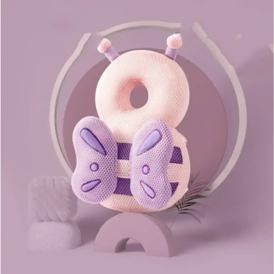 Pastel pink and lavender mesh donut-shaped plush toy with bunny ear accents.