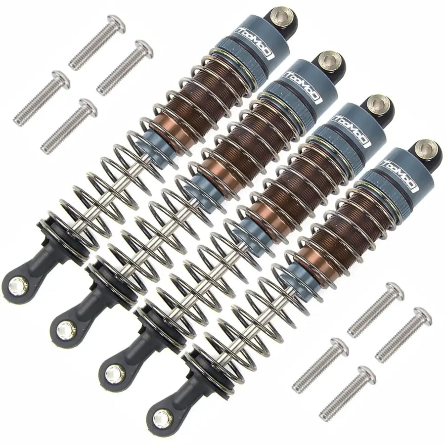 Four blue and copper-colored traxxas rc shock absorbers with black mounting ends.
