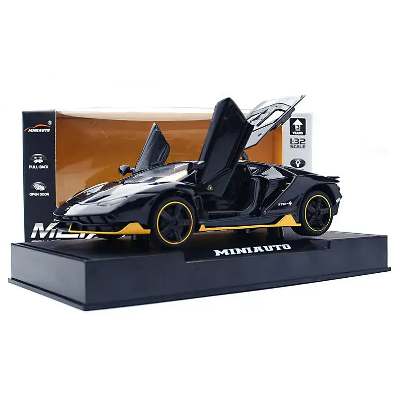Black and yellow die-cast lamborghini model car with scissor doors open, displayed on a branded stand.
