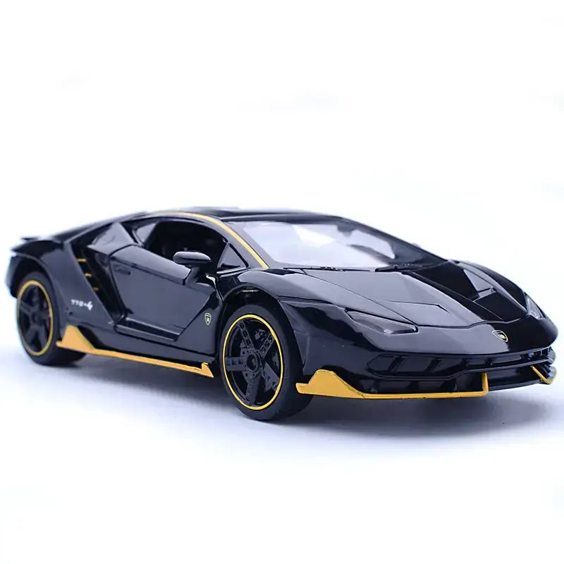 Black and yellow lamborghini centenario diecast model car with detailed metallic finish.