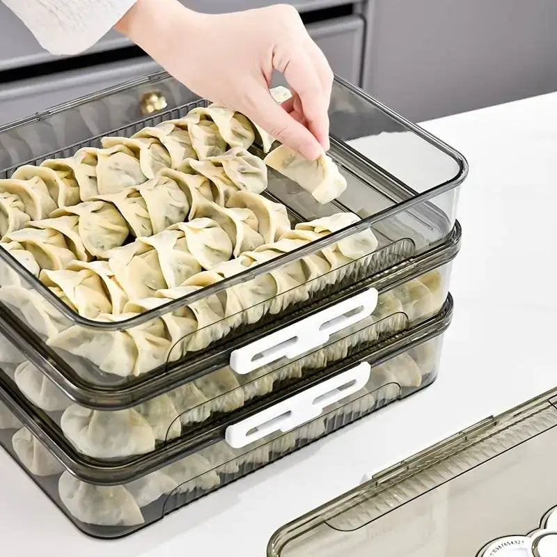Transparent plastic stackable food storage containers with white latches.
