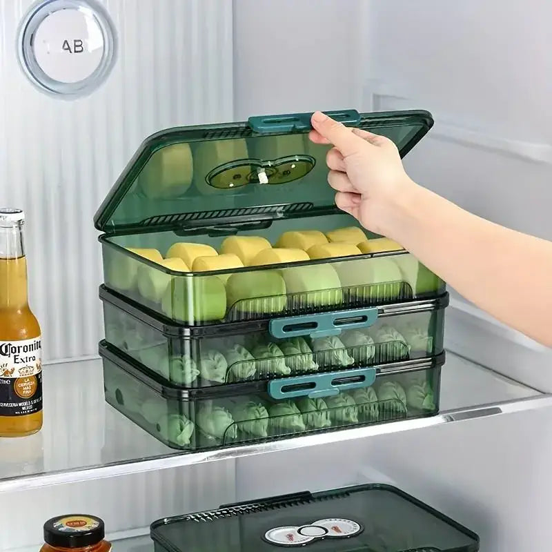 Stacked translucent green plastic egg storage containers with teal-colored handles and lids.